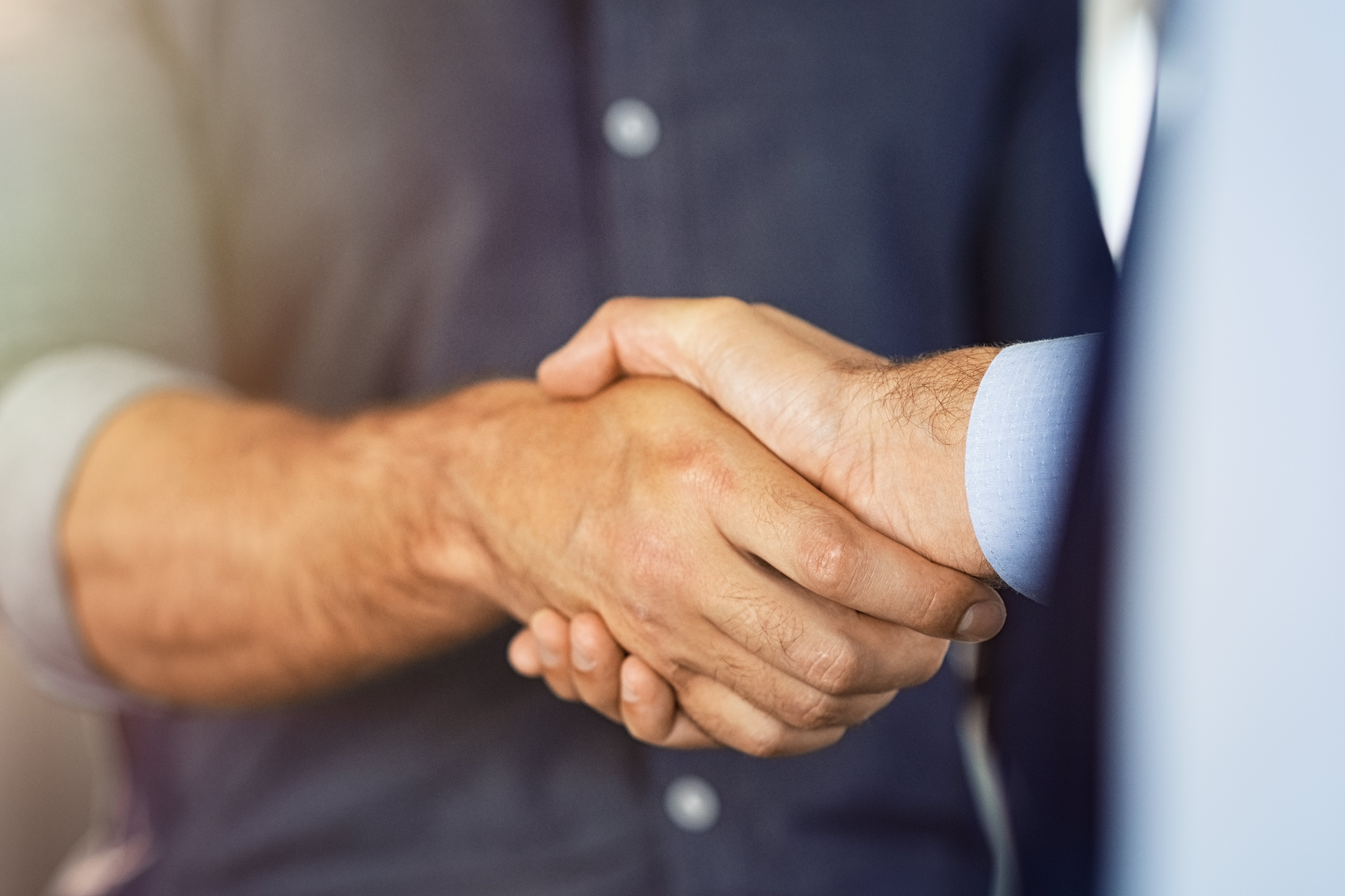 Two people shaking hands
